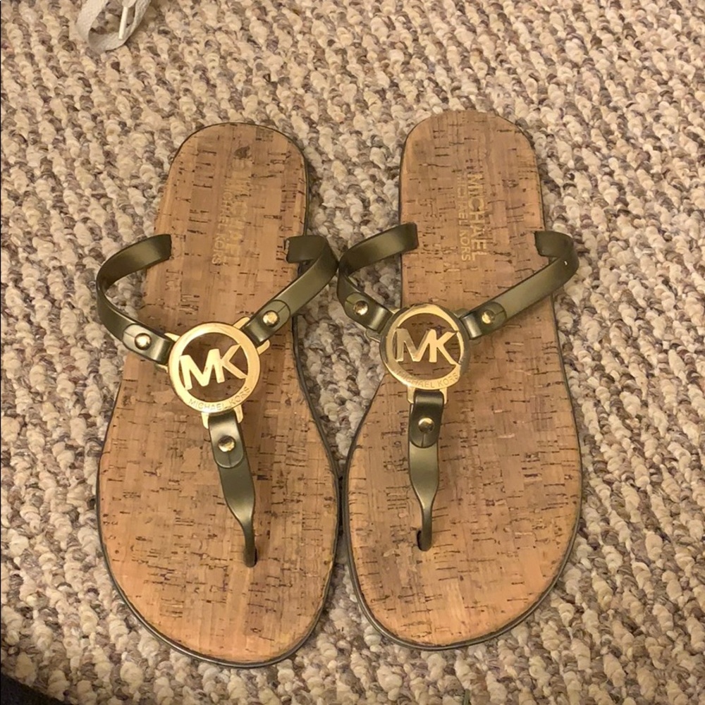 Michael Kor’s sandals.